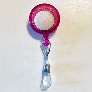 Retractable badge holder